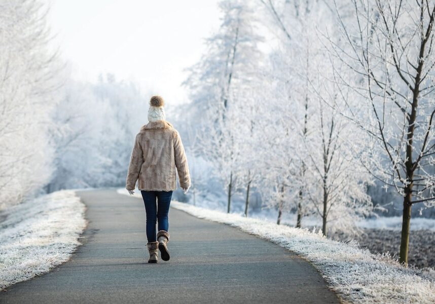 Image of a person walking on a snowy street